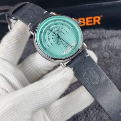 The  Heroforcee watch with a mint green dial and black leather strap.